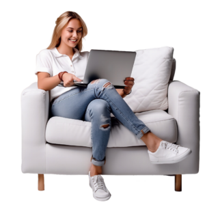 Woman on laptop casually checking on her team from the comfort of her couch. 